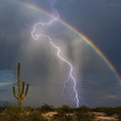 Amazing: Lightning and Rainbow Captured Together