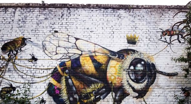 Buzzing the urban walls with a simple but important message: Save the bees!