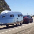 How much impact does the trailer have on Tesla X's range?