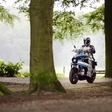 Around the world in 80 days with an electric motorcycle
